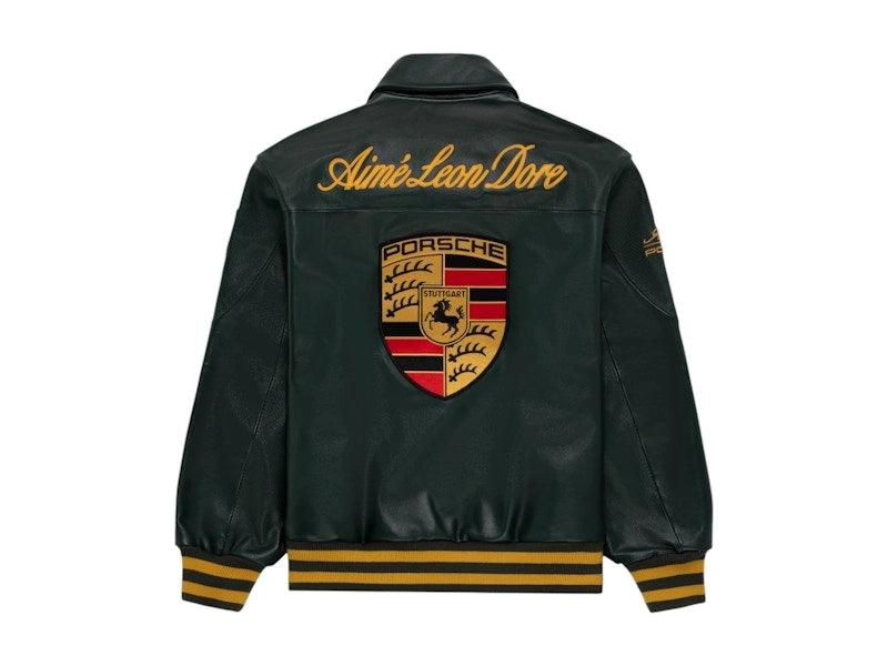 Aimé Leon Dore x Porsche 993 Turbo Leather Club Jacket British Racing Green back view flat lay – vintage racing leather bomber with large embroidered Porsche Stuttgart crest, Aimé Leon Dore gold script lettering, gold striped ribbed hem, white background