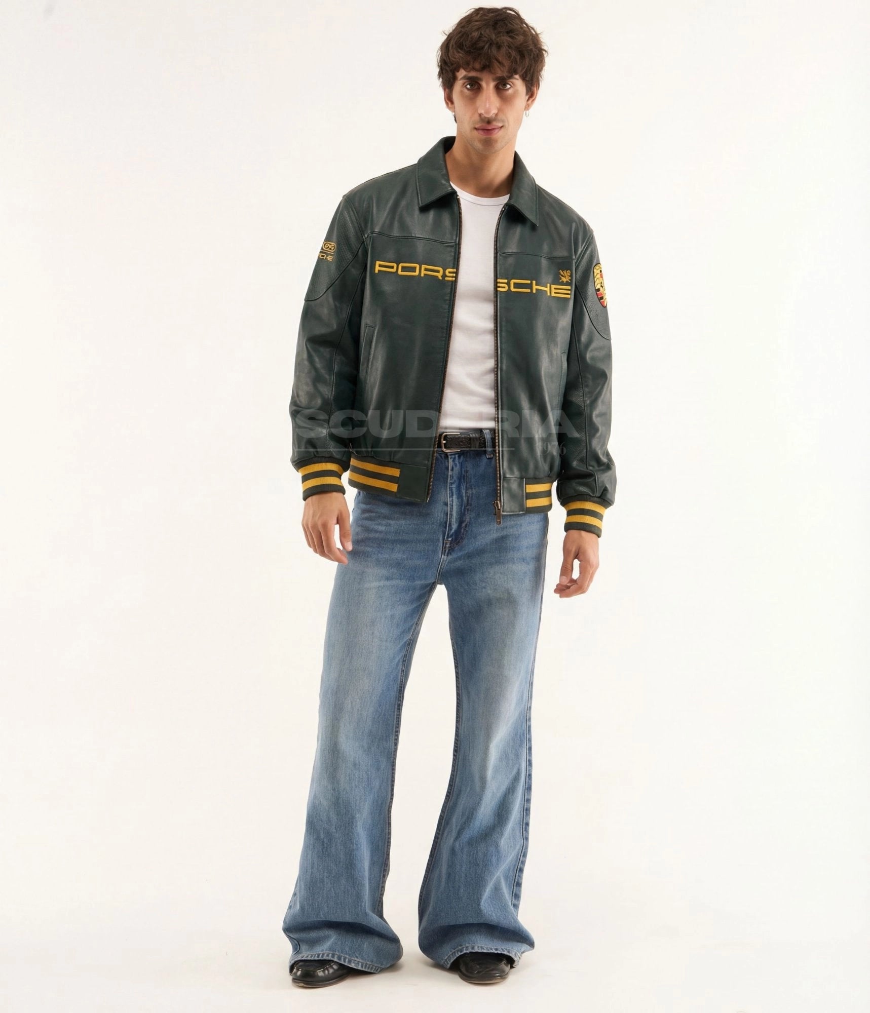 Aimé Leon Dore x Porsche 993 Turbo Leather Club Jacket green full body men – vintage racing leather bomber with gold embroidered Porsche logo, perforated panels, gold striped ribbed trim, styled with wide-leg jeans