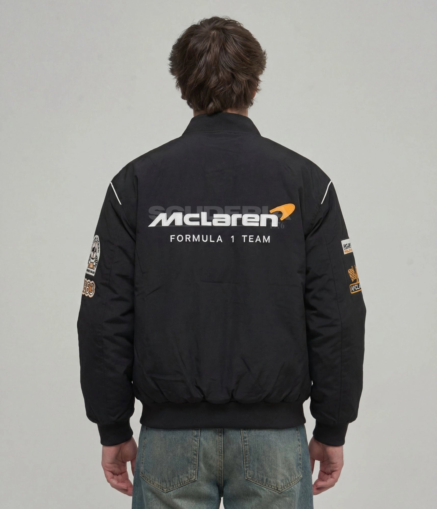 McLaren F1 Racing Jacket black back view men – vintage racing bomber with embroidered McLaren Formula 1 Team logo on back, McLaren Racing and AFCLaren sleeve patches, white piping detail