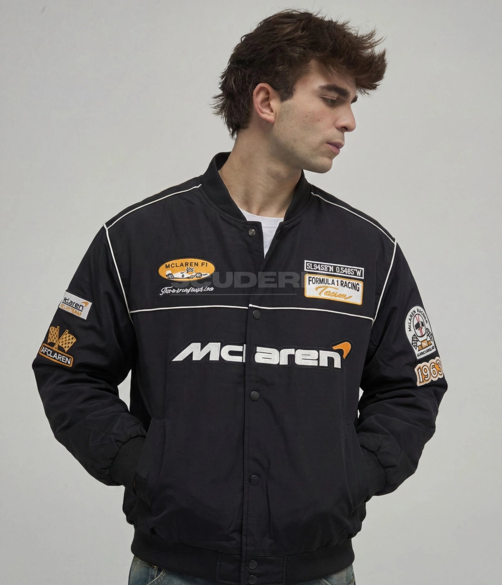McLaren F1 Racing Jacket black front view men – vintage racing bomber with embroidered McLaren logo, McLaren F1 oval patch, Formula 1 Racing Team patch, AFCLaren and 1963 sleeve patches, white piping detail