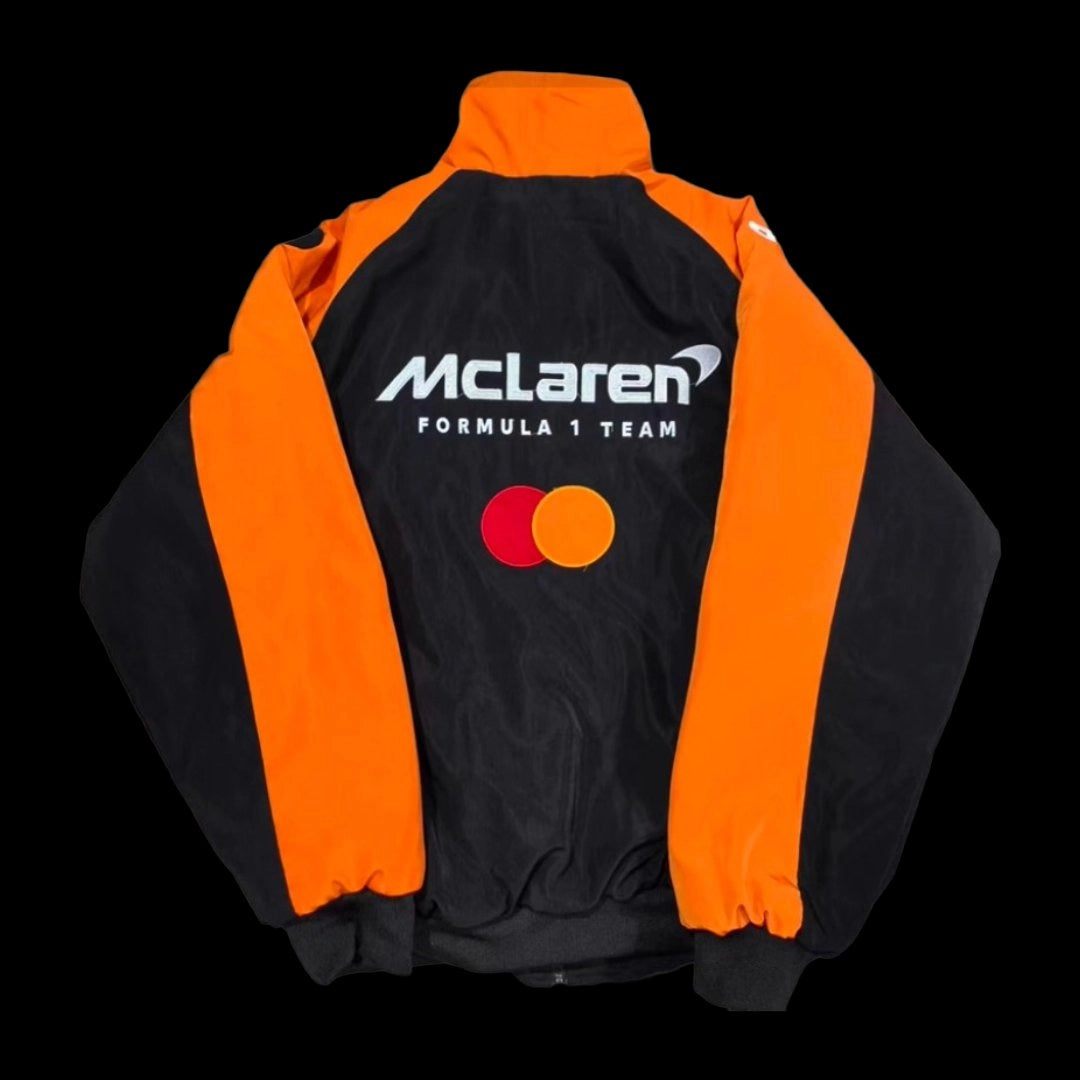McLaren F1 Team Jacket black and orange back view flat lay – vintage racing bomber jacket with embroidered McLaren Formula 1 Team logo and Mastercard sponsor, black background