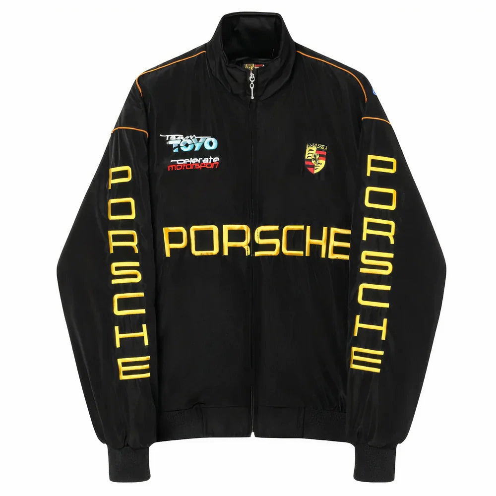 Porsche Vintage Racing Jacket black gold front view flat lay – vintage padded bomber with gold embroidered Porsche chest logo, Porsche crest patch, Team Toyo Accelerate Motorsport embroidery, gold sleeve lettering, white background