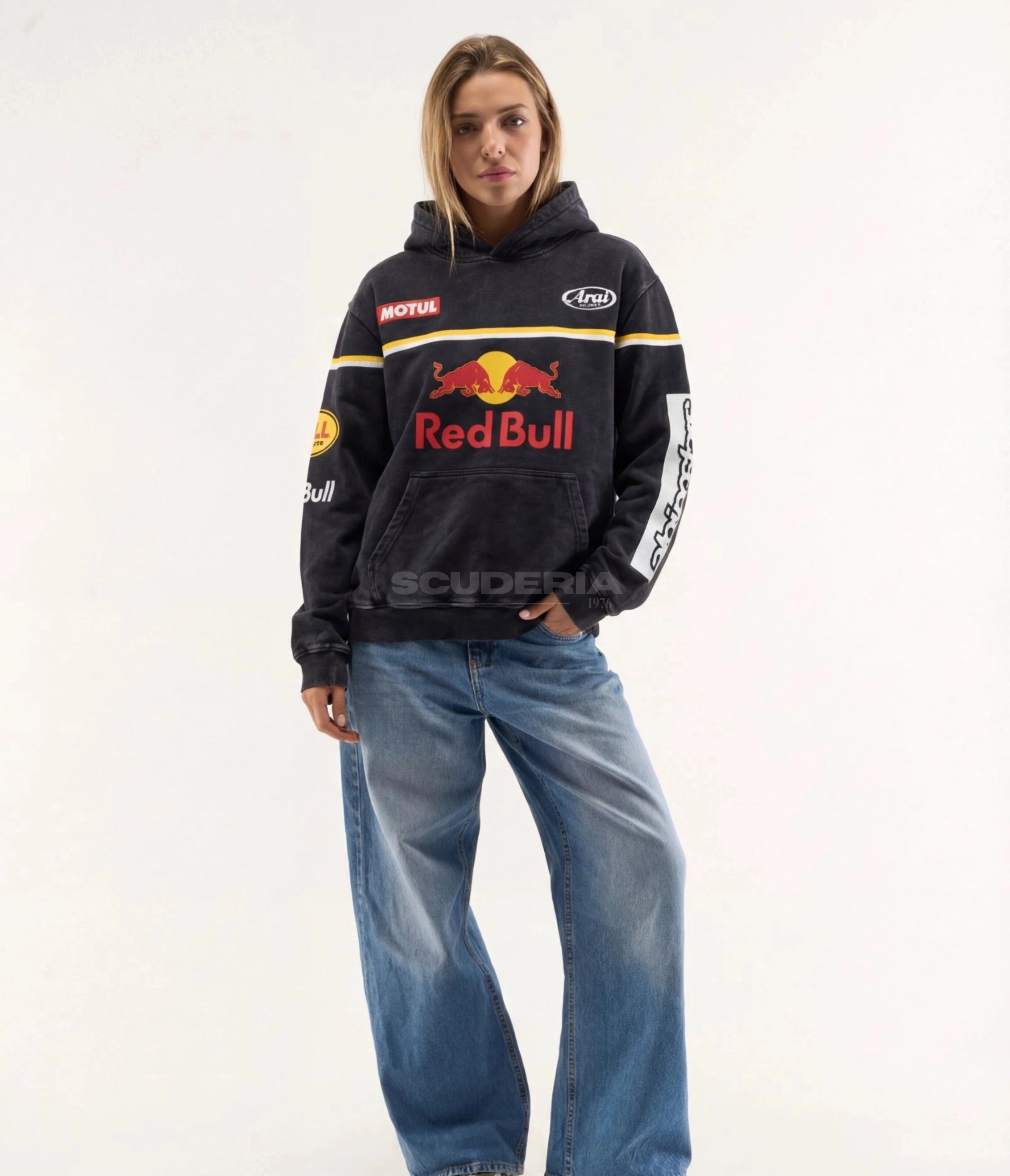 Red Bull Racing Hoodie black washed full body women – vintage oversized motorsport hoodie with Red Bull chest logo, Motul and Arai patches, yellow racing stripe, styled with wide-leg jeans